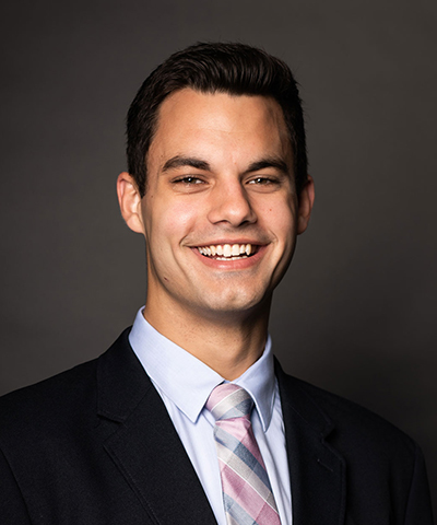 Headshot of Colin Mann.