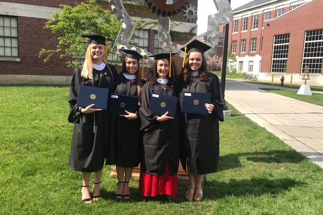 A small group uses in caps and gowns.