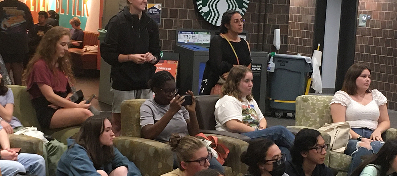 A group of students sitting in Starbucks.