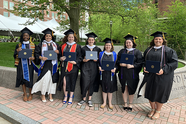A small group uses in caps and gowns.