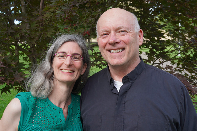 Farny and Duggan smiling at the camera.