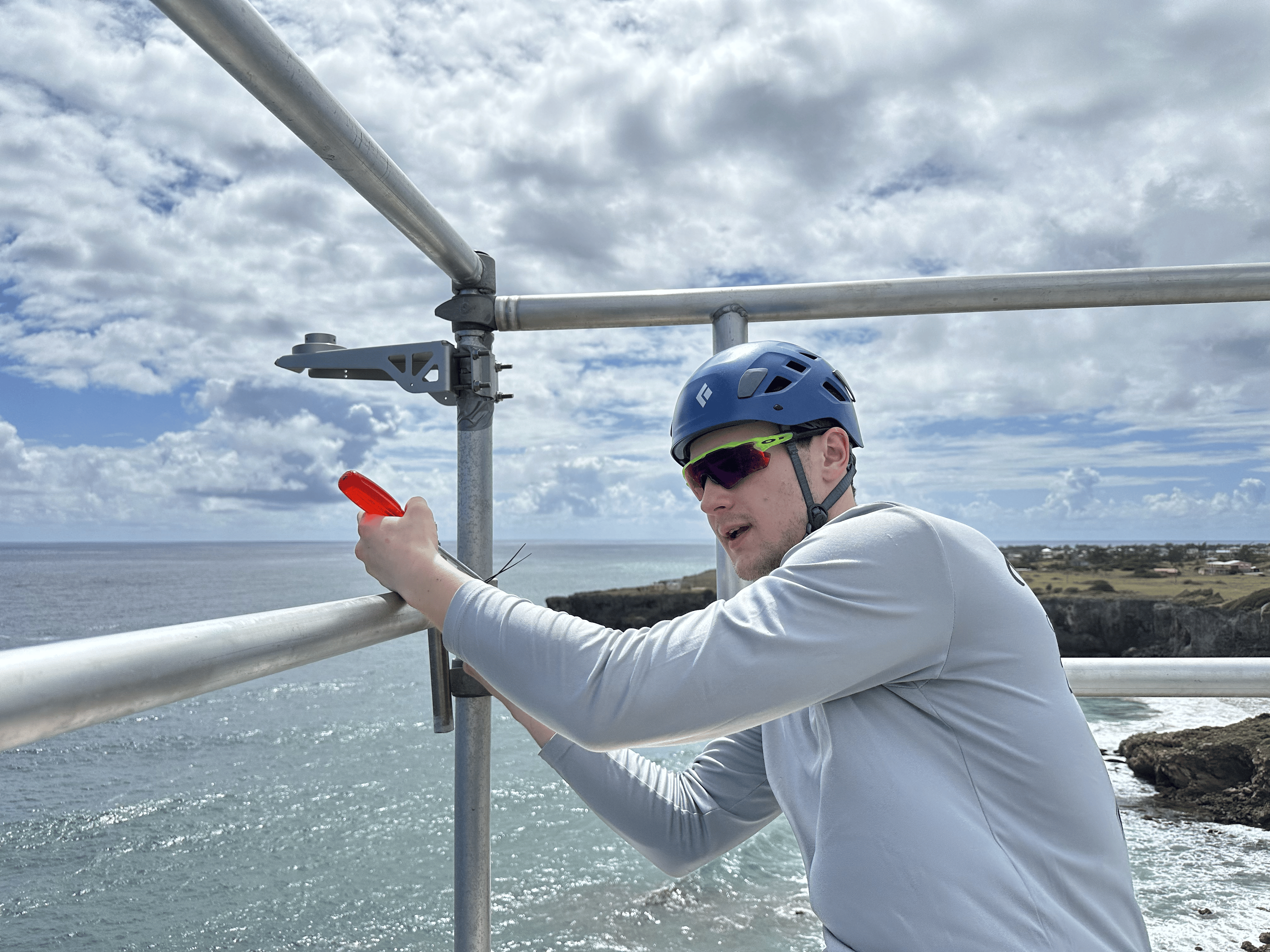 Sebastian installing inlet on tower in Barbados