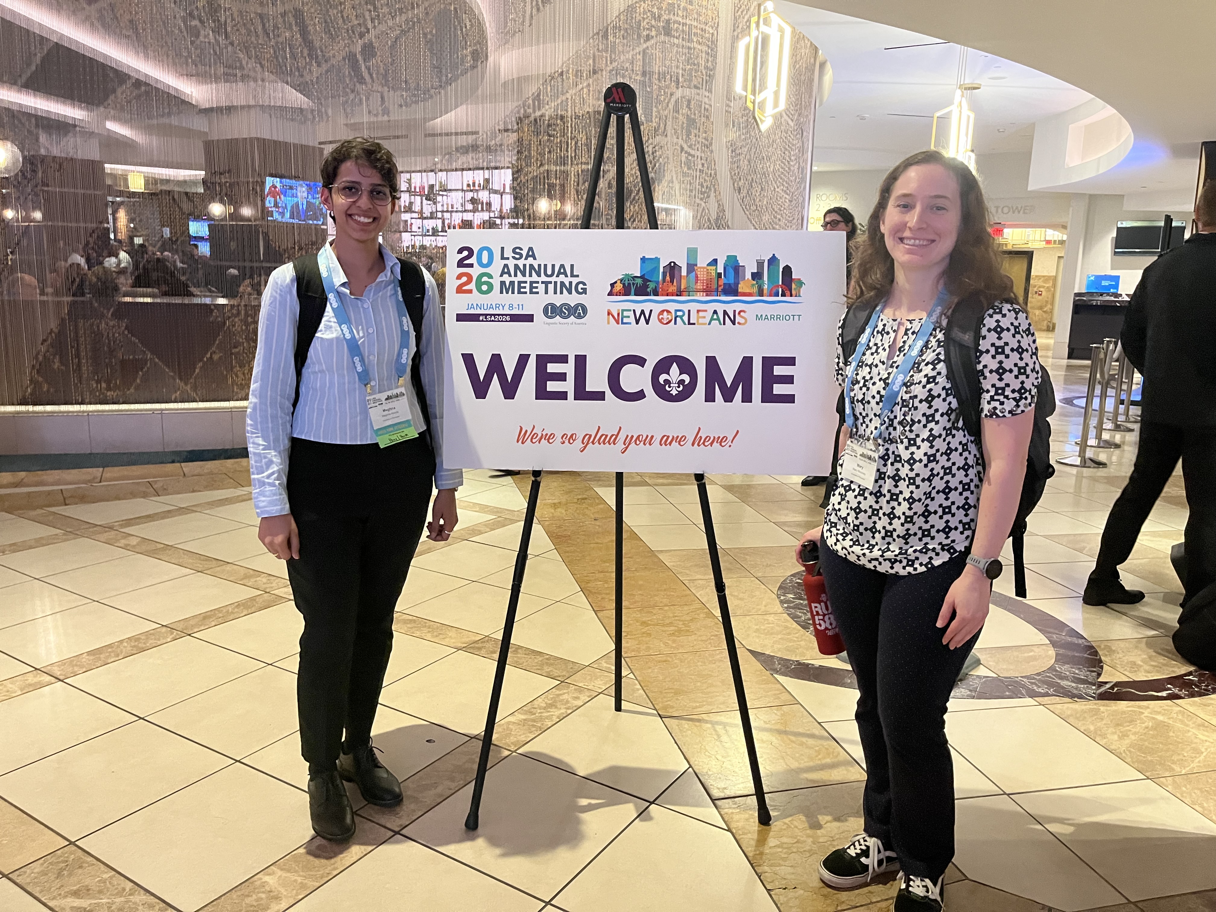 Photo of student and professor with poster