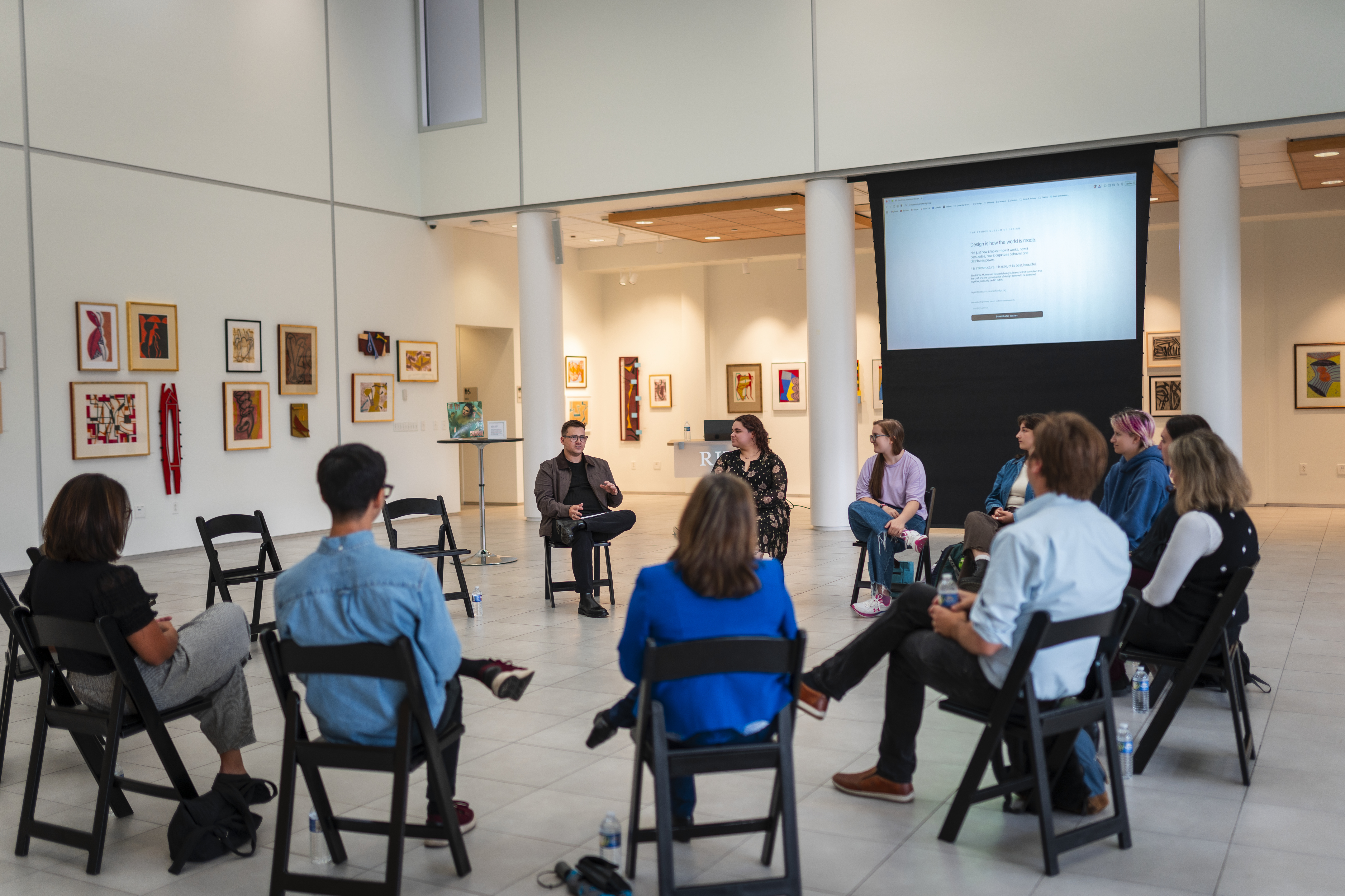 Group of people sitting in a circle talking
