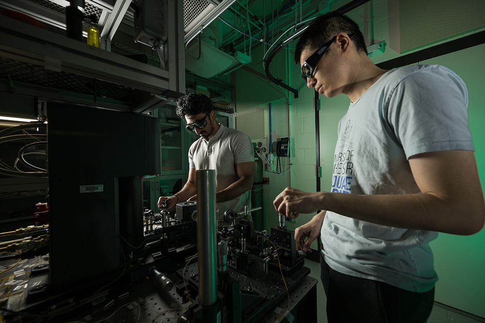 Students working in a dark lab.