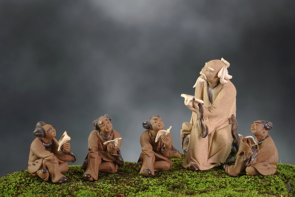 A computer-generated image of Confucius and followers.